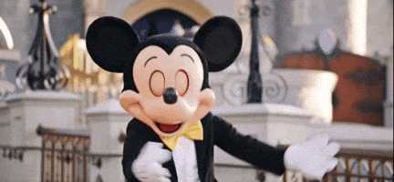 Mickey Mouse In Tuxedo With Yellow Bow Tie GIF