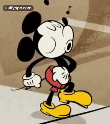 Mickey Mouse Is Walking Down A Street With A Music Note Hanging From His Ears . GIF