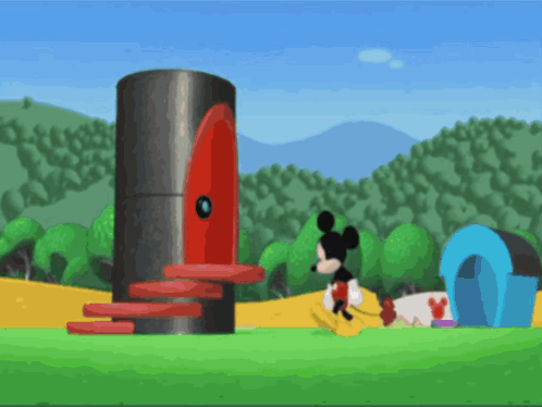 Mickey Mouse Standing by Large Red Cylinder