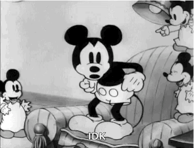 Mickey Mouse Standing On Chair Black And White GIF