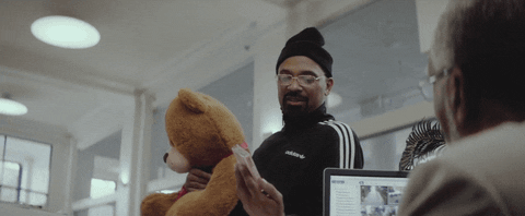 Mike Epps Hugging Big Stuffed Toy GIF