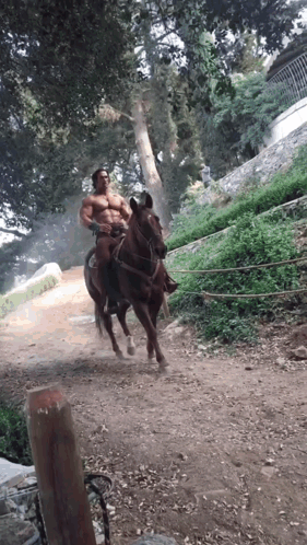 Mike O'hearn Half Naked Horseback Ride GIF