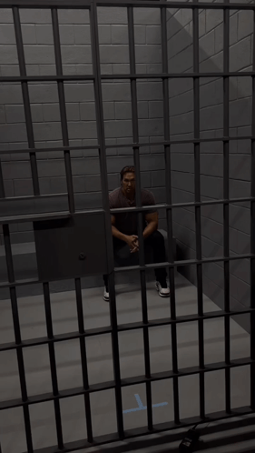 Mike O'hearn Sitting In Prison Cell GIF