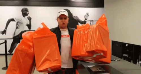 Mike Shop Nike Products Flexing GIF