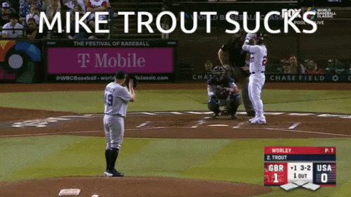 Mike Trout Sucks On A Baseball Field With A T Mobile Ad In The Background GIF