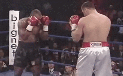 Mike Tyson Knocking Out Golota GIF