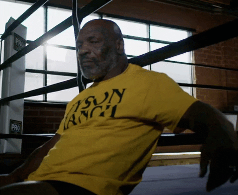 Mike Tyson Relaxing On Ringside GIF