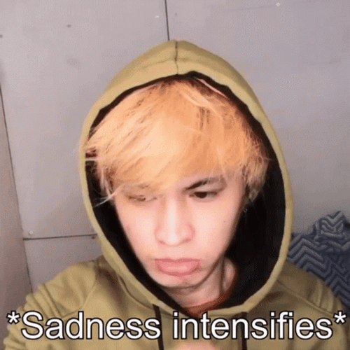 Mikoy Rubbing Face Presenting Sadness GIF