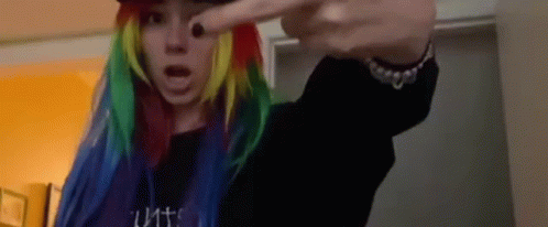 Mila Cornhole Rainbow Hair Singing GIF