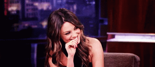 Mila Kunis Nervous Laughing GIF