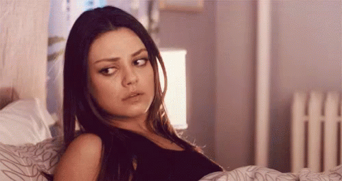 Annoyed Mila Kunis In Bed GIF