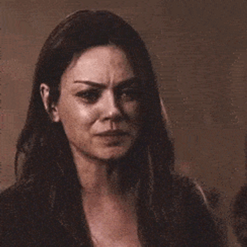 Mila Kunis Covering Mouth Trying Not To Cry GIF