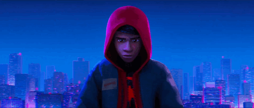 Miles Morales From Spider-Man Into The Spider-Verse Stands In Front Of A City Skyline . GIF