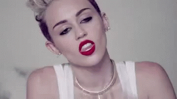 Miley Cyrus Touch Her Tongue GIF