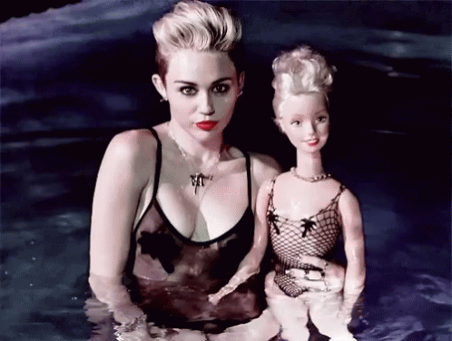 Miley Cyrus Swimming With Barbie GIF