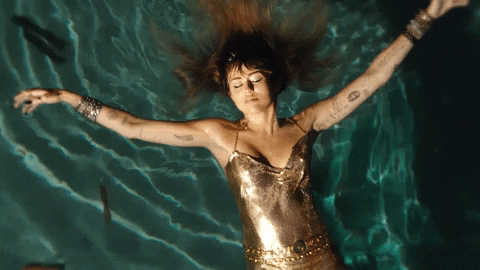 Miley Cyrus Floating On Water Music Video GIF