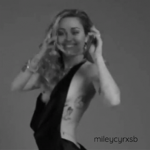 Miley Cyrus Wearing Crowns GIF