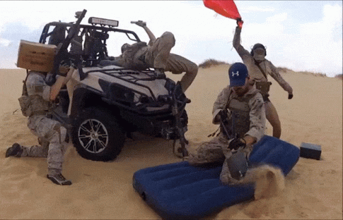 Military On The Dessert Sand GIF
