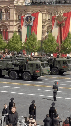 Military Vehicles Parked in Front of Building