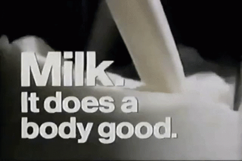 Milk Is Poured Into A Glass With The Words Milk It Does A Body Good GIF