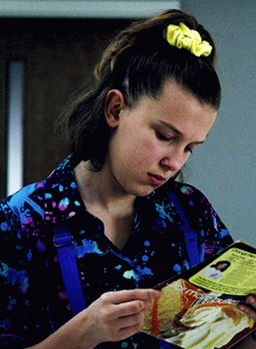 Millie Bobby Brown Reading Magazine GIF