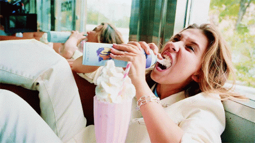 Millie Bobby Brown Eating Whipping Cream GIF