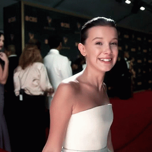 Millie Bobby Brown Wearing White Dress GIF