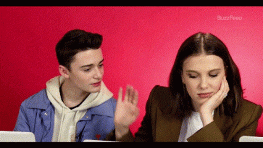 Millie Bobby Brown Pushing Noah Schnapp GIF