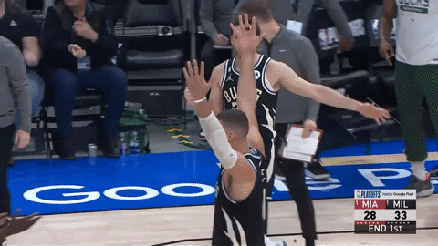 Milwaukee Bucks Jrue Holiday Brook Lopez Low Five GIF