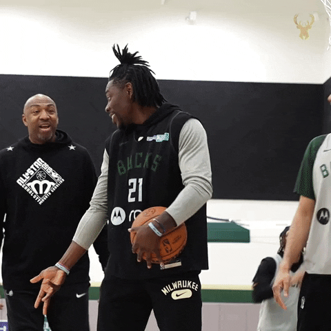 Milwaukee Bucks Jrue Holiday Pointing Upward GIF