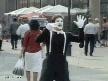 Mime Man Waving at Crowd
