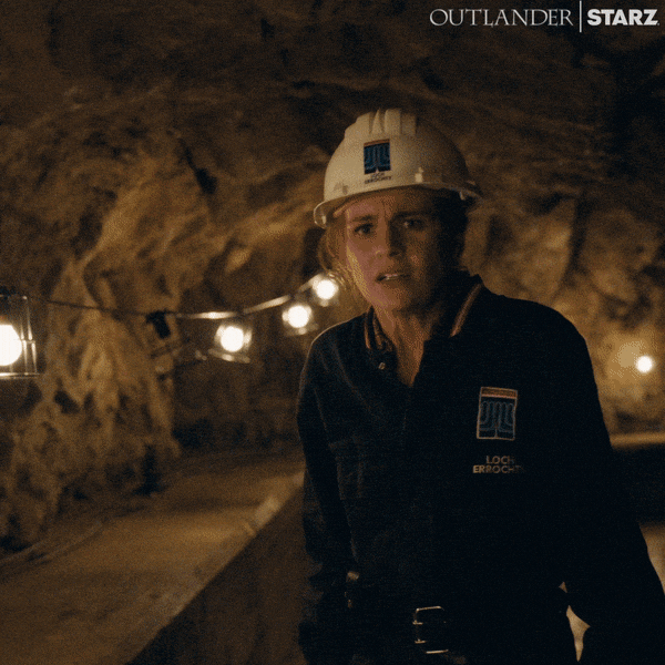 Miner Woman Ear Plugs Inside Mine GIF