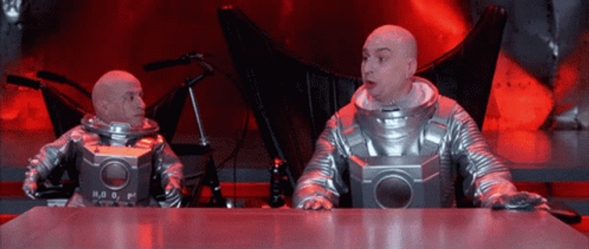 Mini Me And Dr Evil Wearing Space Suit GIF