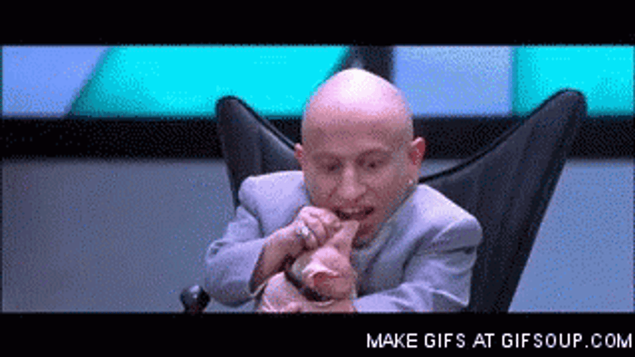 Mini Me Gnawing Cat Ears GIF