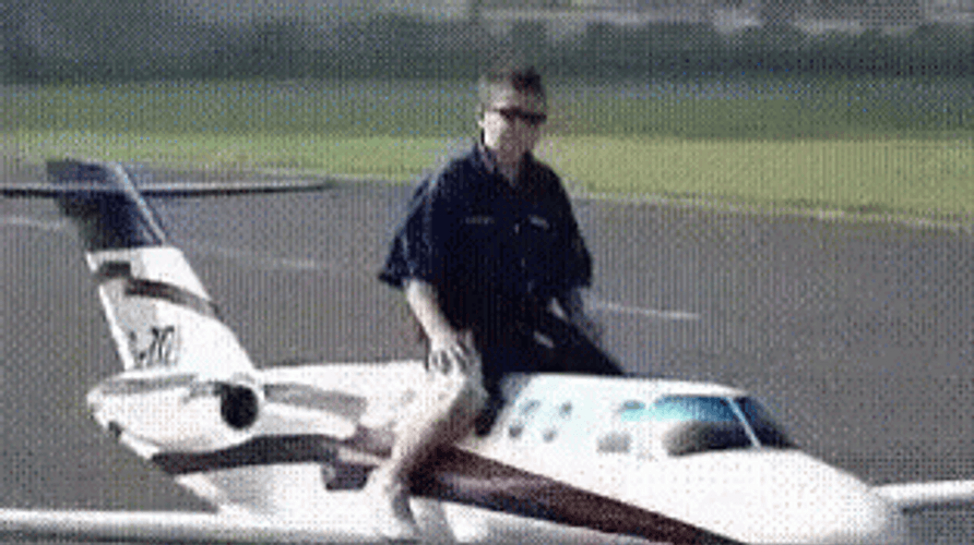 Miniature Aircraft Flying On Ground GIF