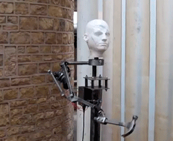 Miniature Humanoid Smashing Hammer GIF