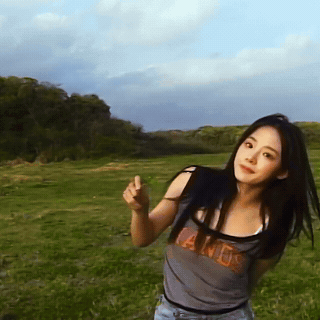 Minji Holding 4 Leaf Clover GIF