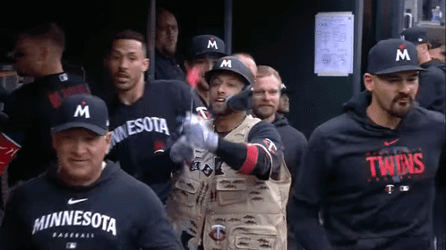 Minnesota Twins Baseball Players Walking to Dugout