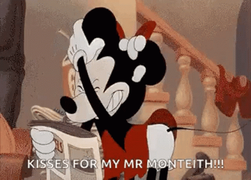 Minnie Mouse Holding Newspaper Kisses for Mr Monteith