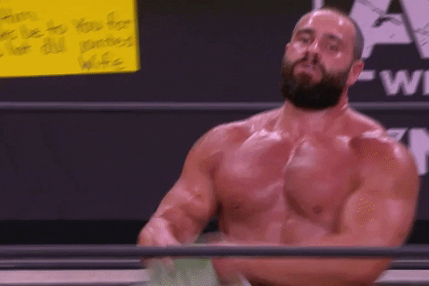 Miro Showing Off Championship Belt GIF