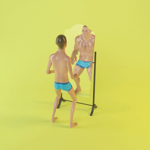 Animated Man Flexing In The Mirror GIF