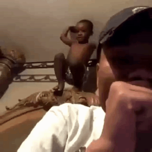 Mischievous Baby Acrobatic Jump Meme GIF