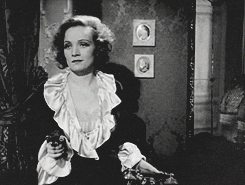 Mischievous Marlene Dietrich Pointing Gun GIF