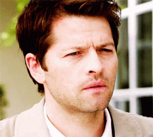 Misha Collins Squinting Supernatural GIF