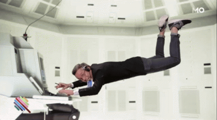 Mission Impossible Man Floating While Working GIF