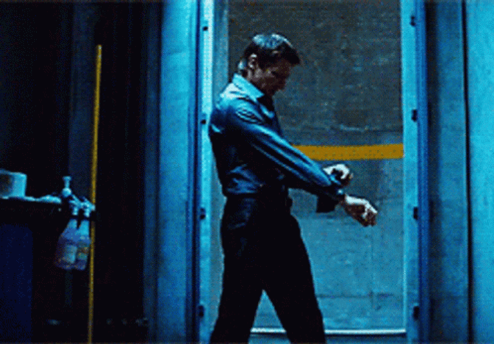 Mission Impossible Man Stretching Arms GIF