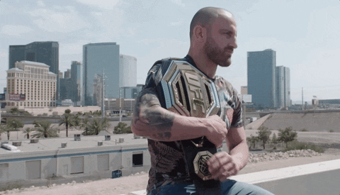 Mix Martial Artist Cédric Doumbé Showing Belt GIF