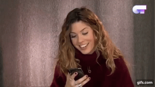 Model Miriam Gonzalez Laughing At Text Message GIF