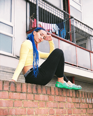 Model Posing With Crocs GIF