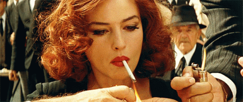Monica Bellucci Puffing Smoke GIF